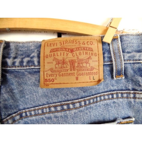 550 zipper fly denim high waisted relaxed tapered leg blue jeans - Picture 3 of 4